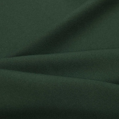 Ткань костюмная 21010 2076, 225 гр/м2, шир.150см, цвет т.зеленый - купить в Оренбурге. Цена 394.71 руб.